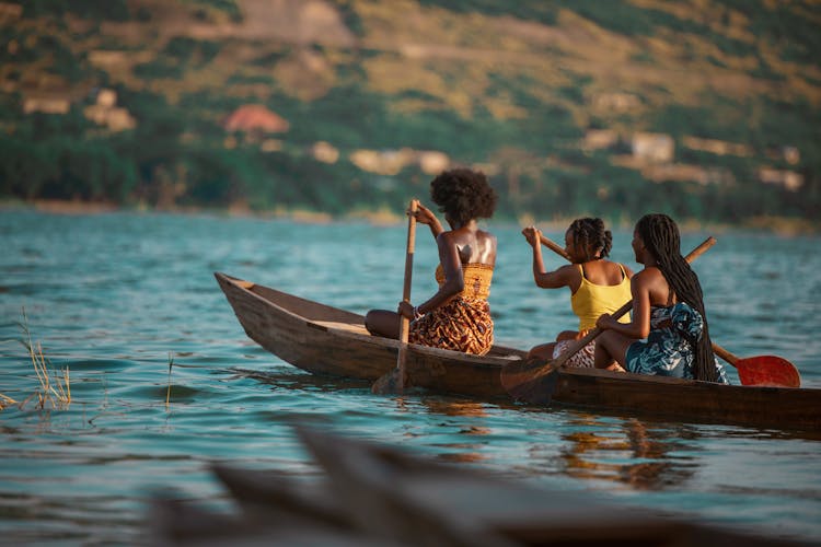 Women In Boat On River