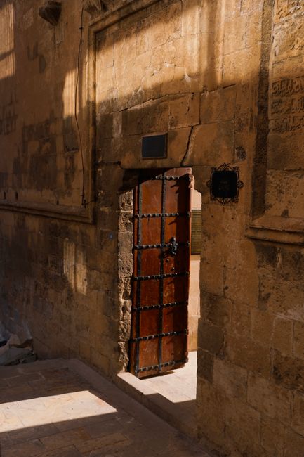 A captivating look at an ancient Turkish doorway, exuding historical charm and texture.