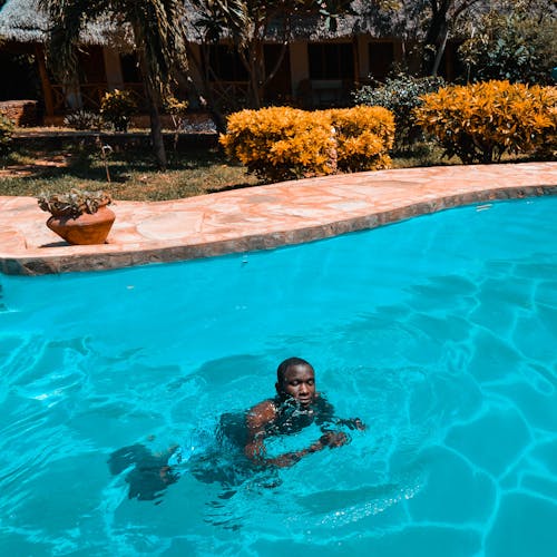 Kostnadsfri bild av afroamerikansk man, bassäng, simbassäng