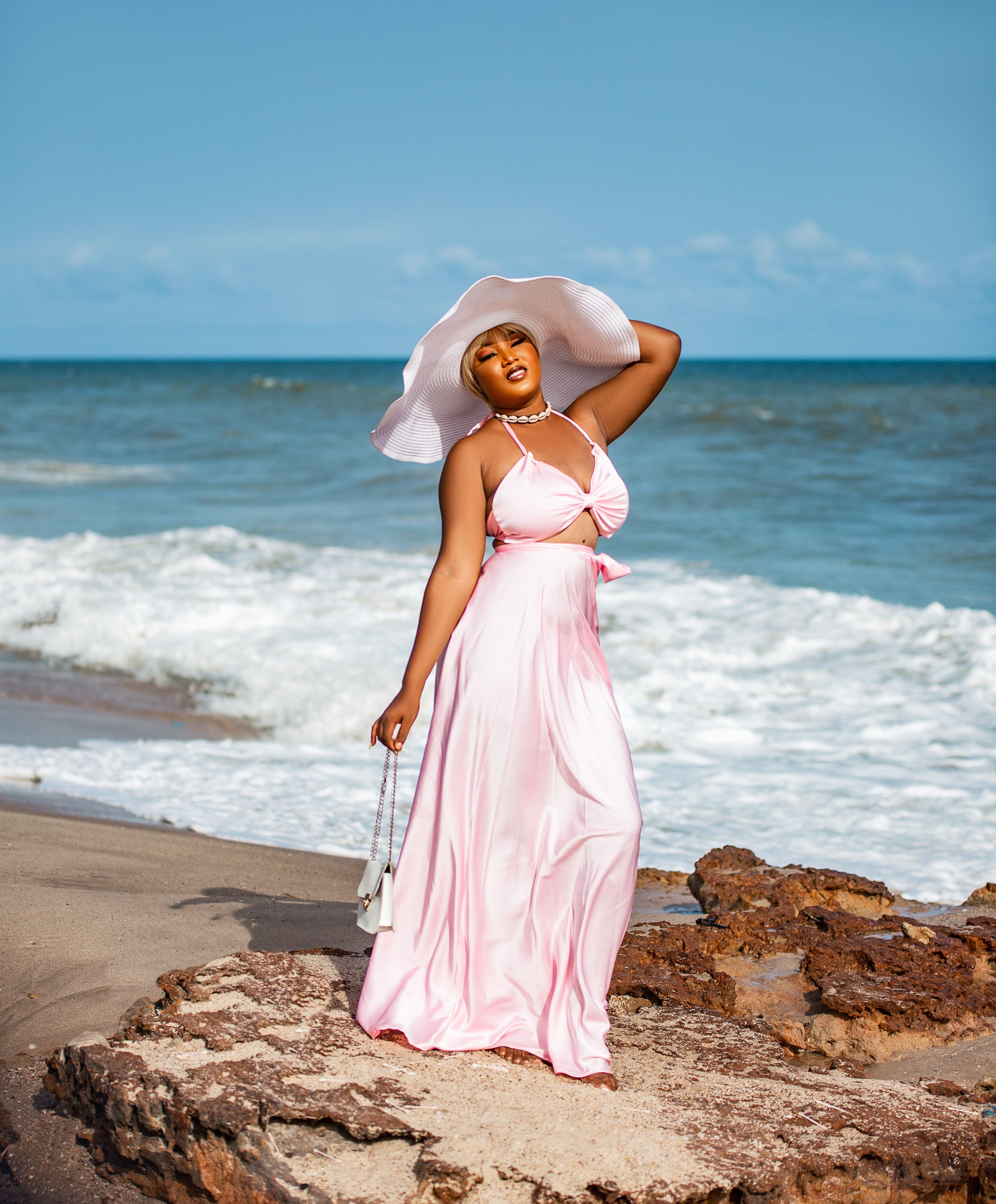 Woman in Summer Dress and Hat at Beach  Free Stock Photo