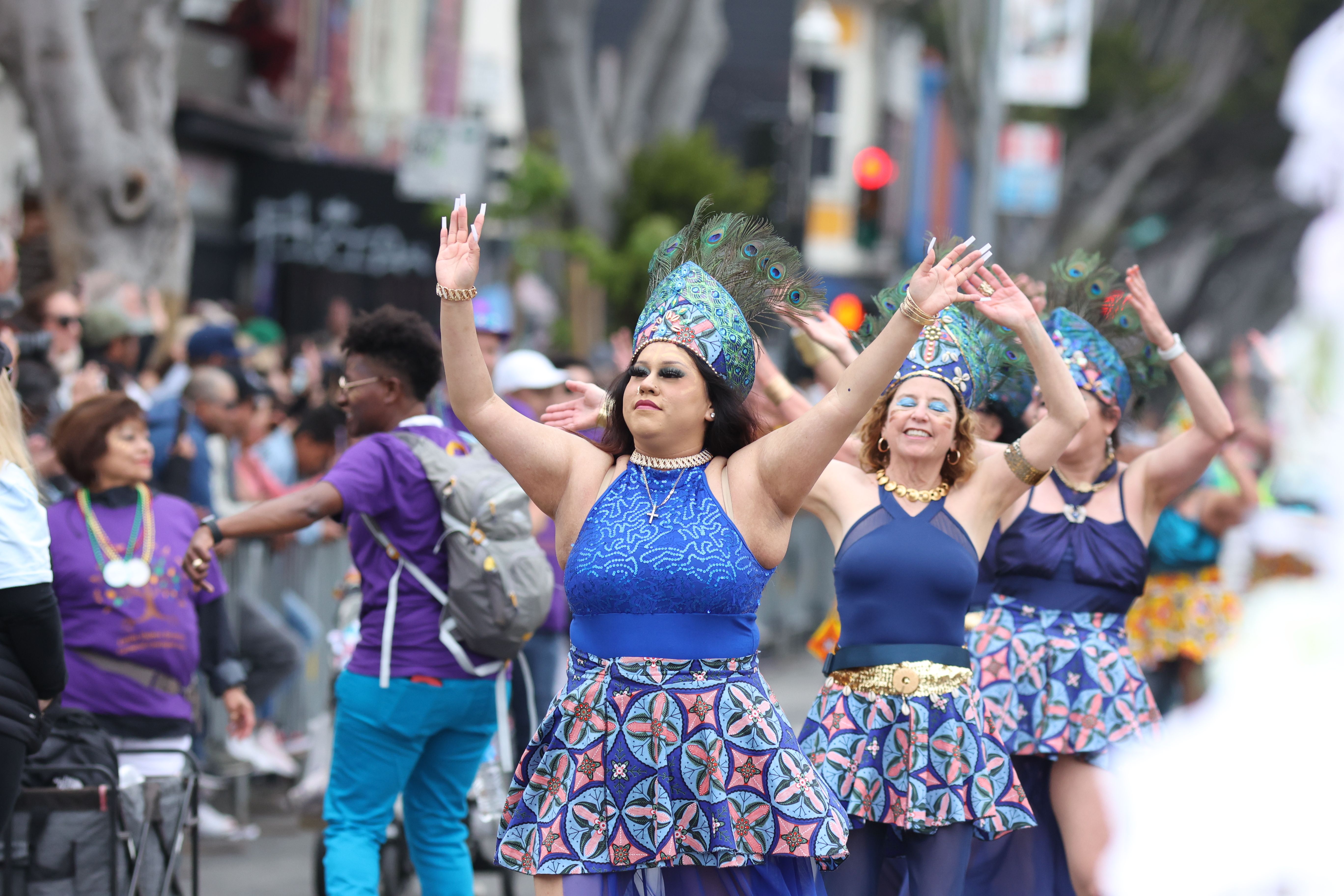 Costumed dancers on Makariou Avenue during the Limassol grand carnival parade