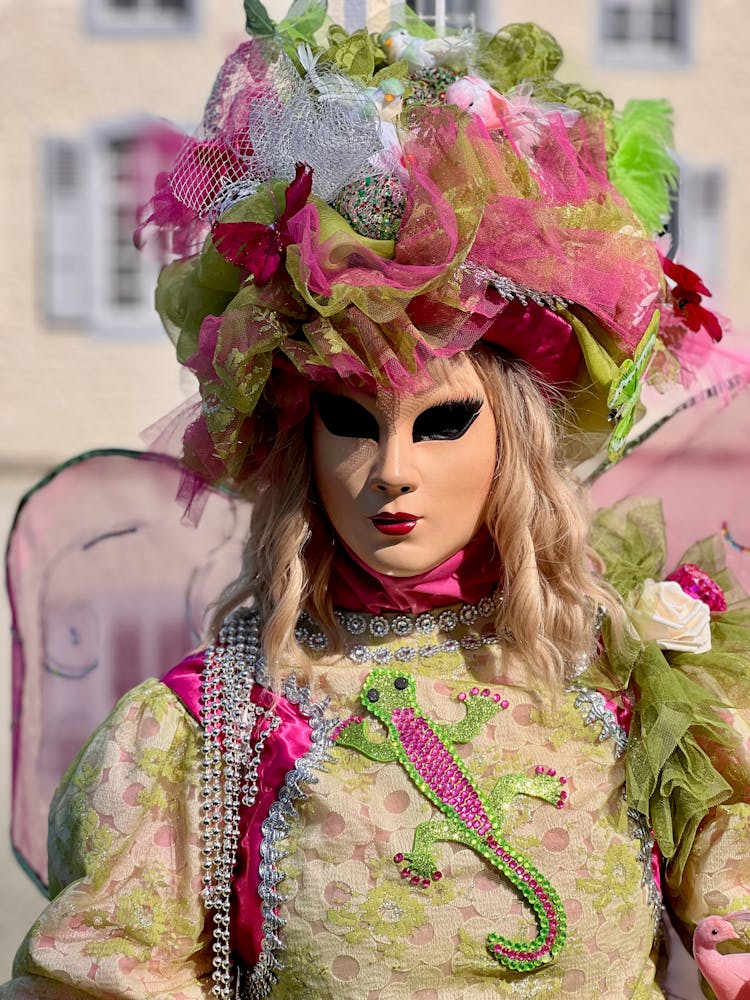 Woman In A Costume And Mask For The Venice Carnival Standing Outside