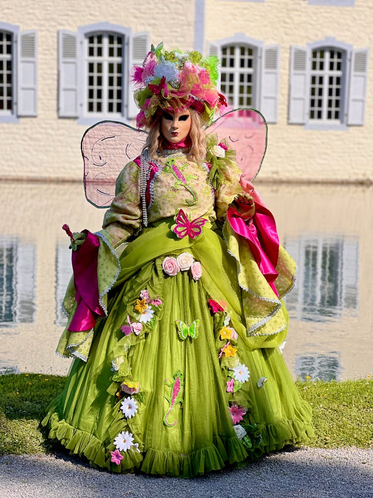 Person In A Costume And Mask At The Carnival Of Venice