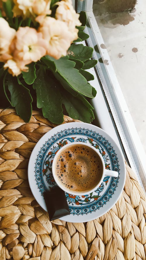 Free A Cup of Black Coffee and a Cube of Chocolate  Stock Photo