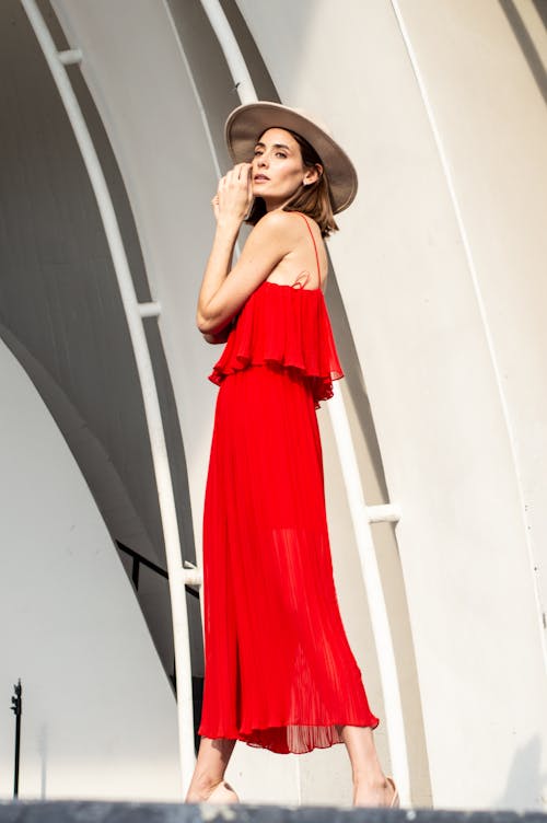 Woman in Hat and Red Dress