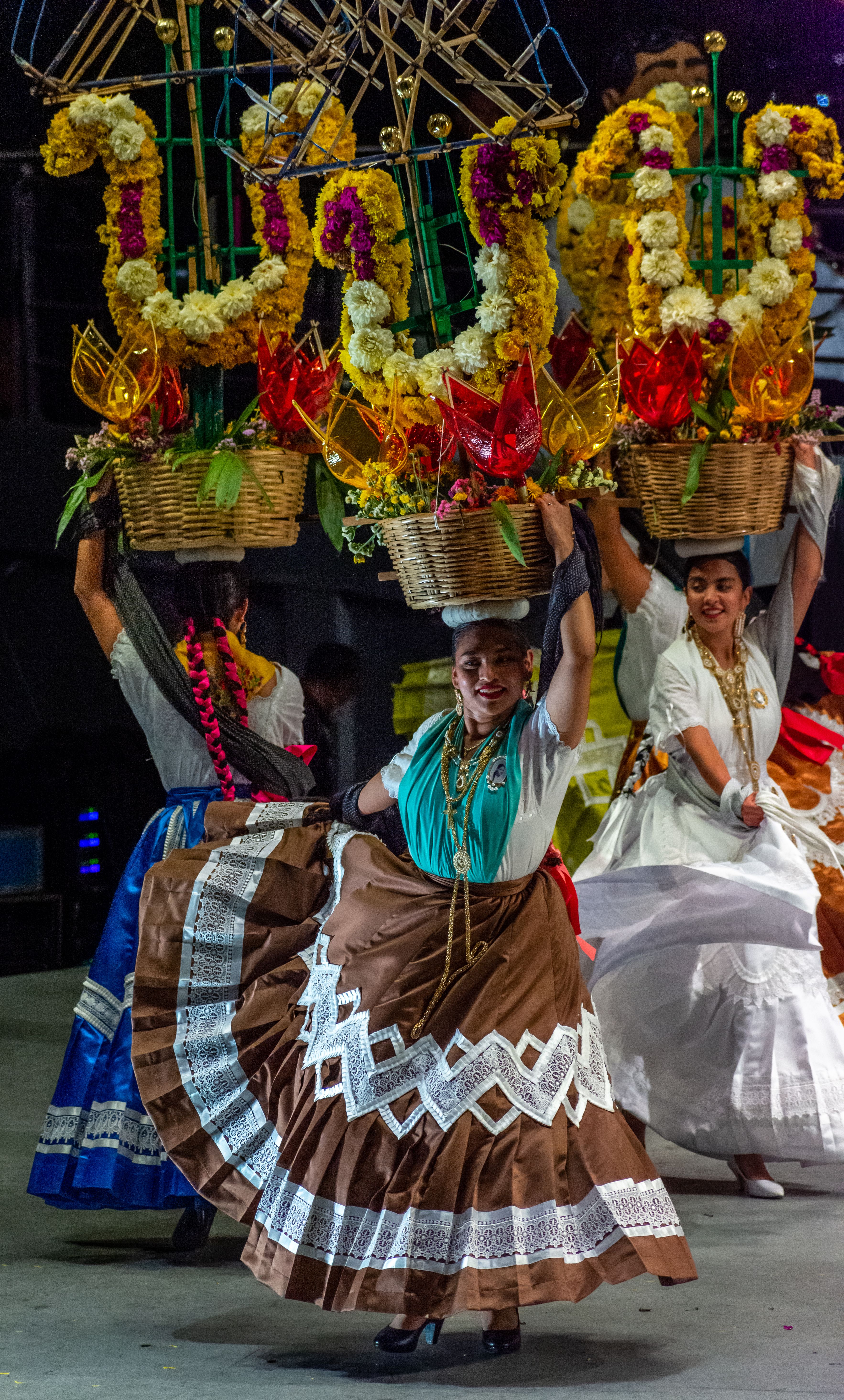 A group of women in traditional costumes are dancing · Free Stock Photo