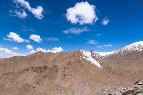 Free Majestic barren mountains under a bright blue sky in Leh, India. Stock Photo
