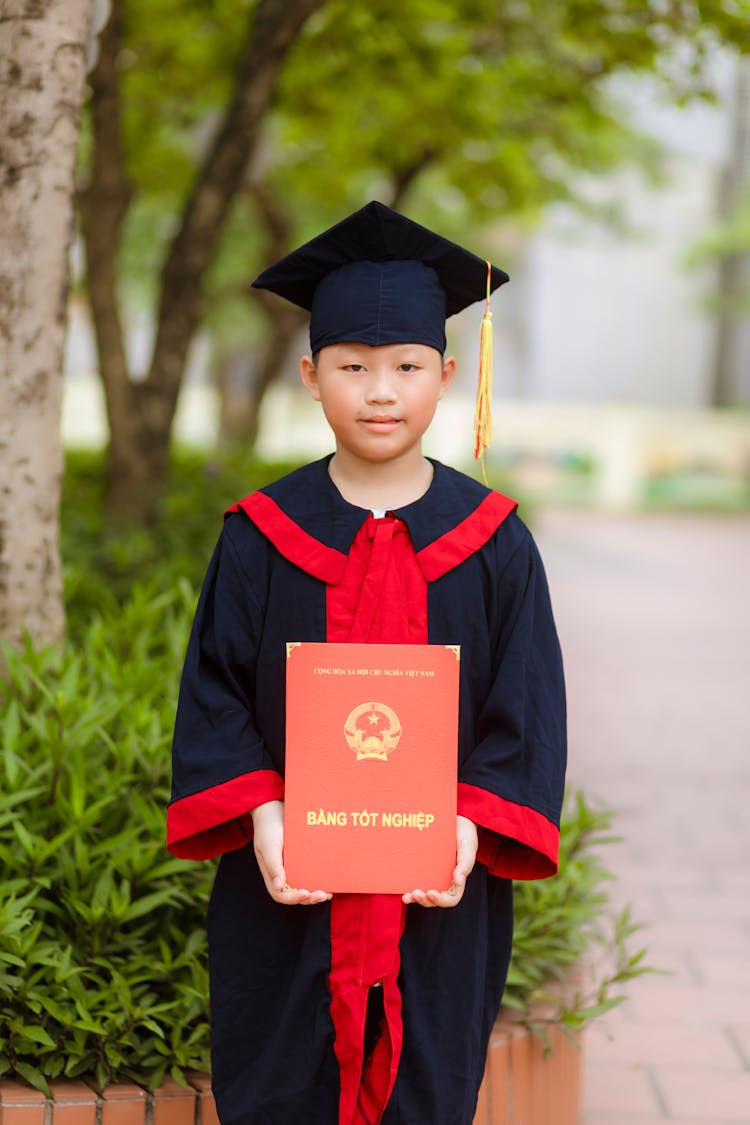 Boy In Graduation Gown