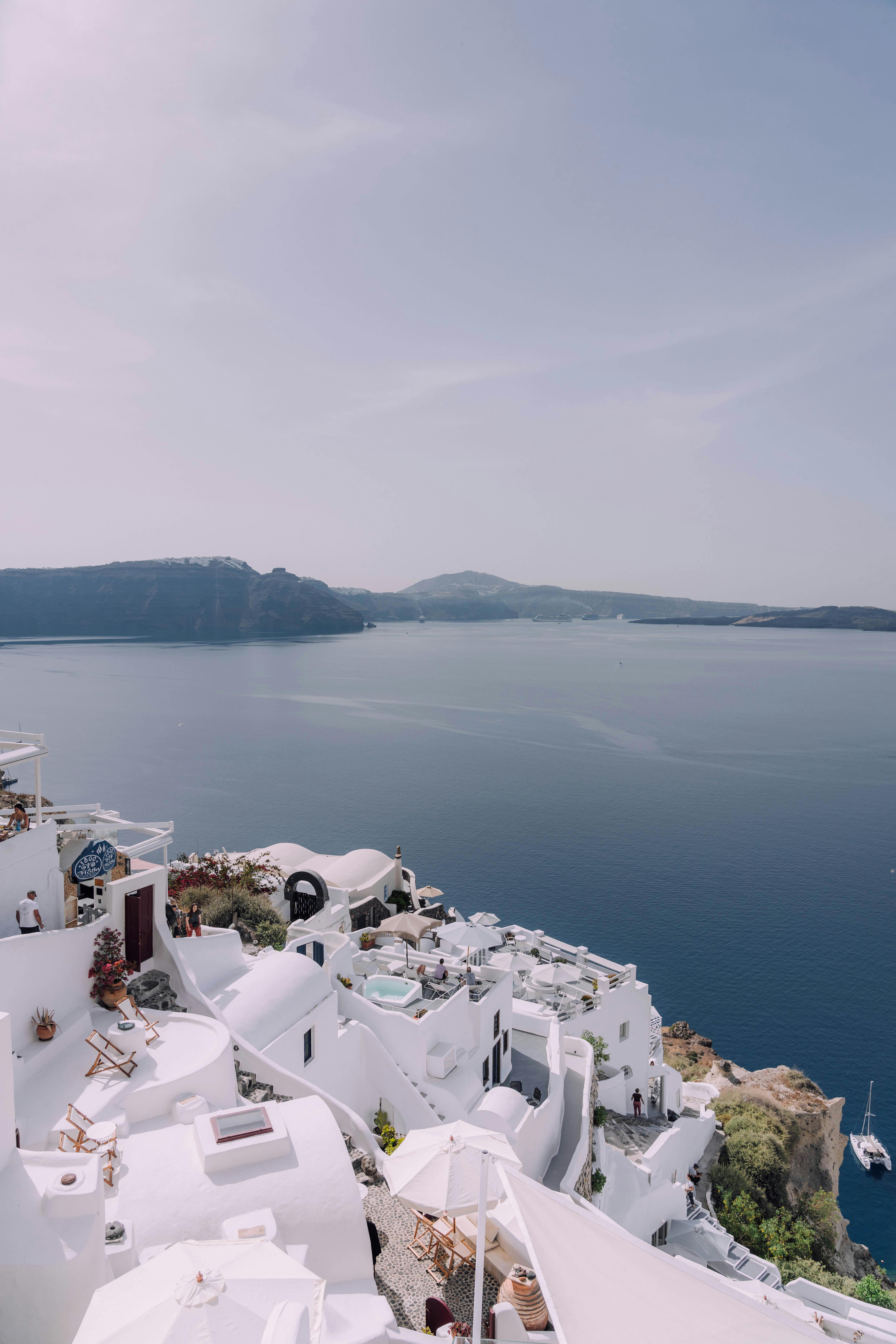 Premium Photo | Fantastic evening urban view of santorini island greece.  picturesque autumn sunset famous travel