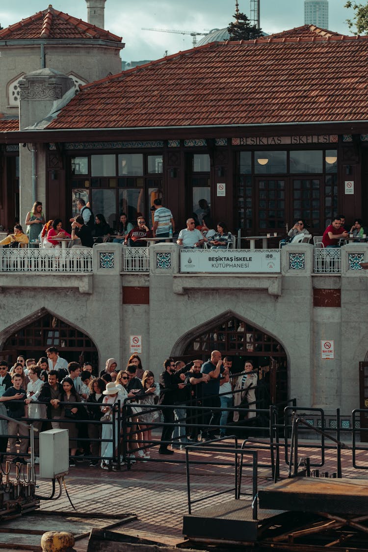 Crowd Of People Watching The Stage