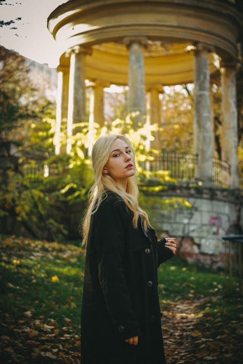 Blonde Woman Posing in Coat