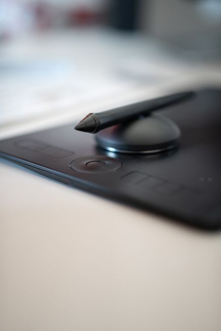 tablet and stylus pen on table