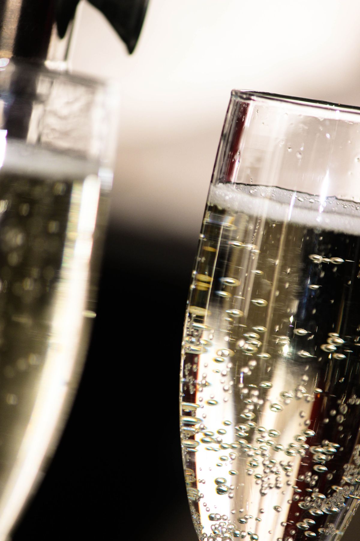 Two flutes packed with fine rising bubbles