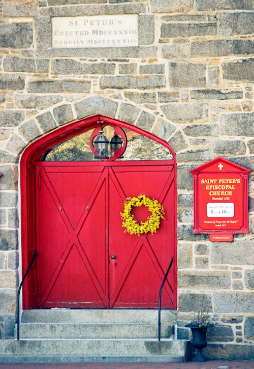 Free Red Wooden Door Beside Saint Peter's Episcopal Church Signage Stock Photo