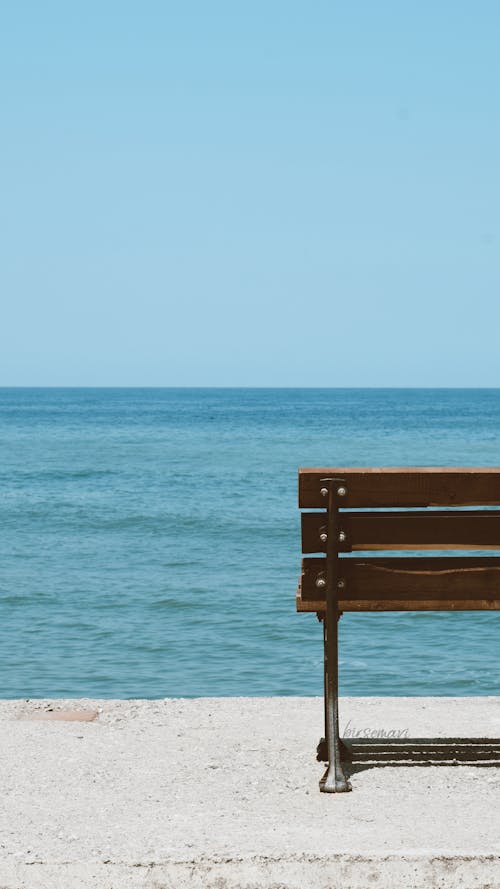 A Bench on the Shore with the View of the Sea 