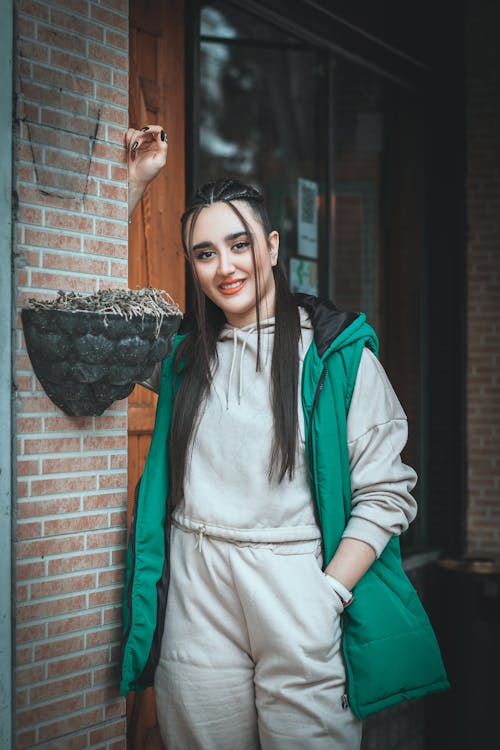 Smiling Woman in Vest