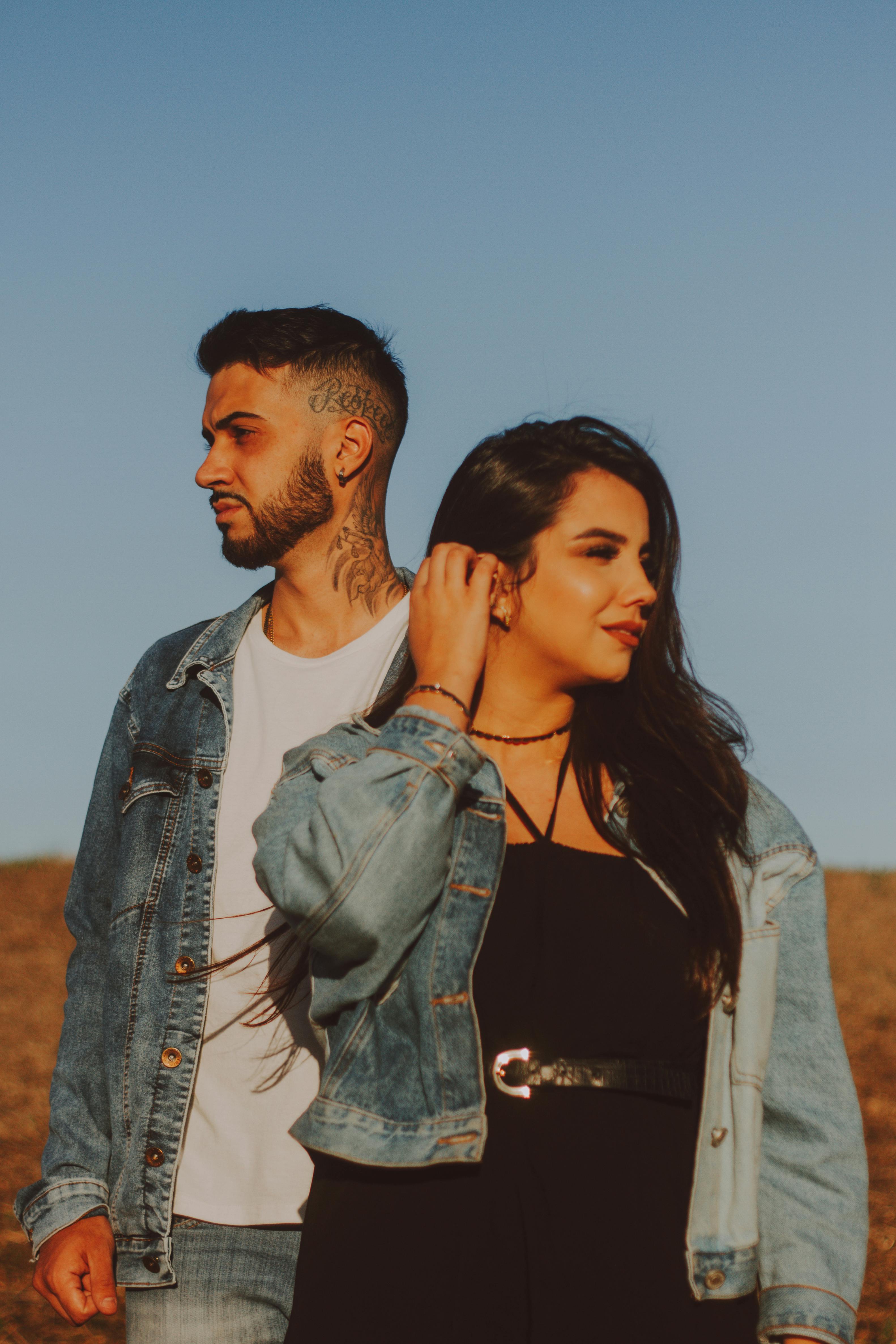 Serious couple in denim clothes Stock Photo by ©sanneberg 147567629