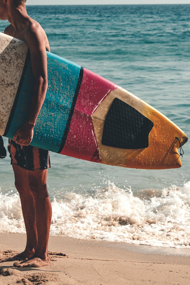 Surfboard Held By A Surfer