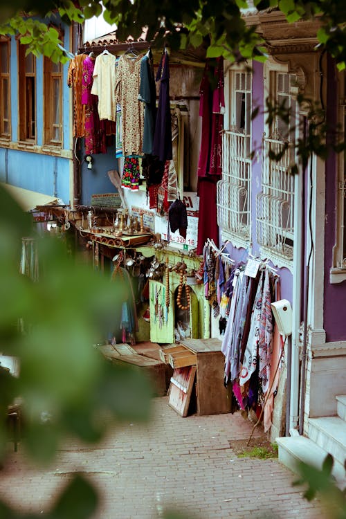 Clothes and Jewelry on Display in front of a Store 