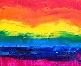画布上是一幅以彩虹为主题的彩色抽象丙烯画