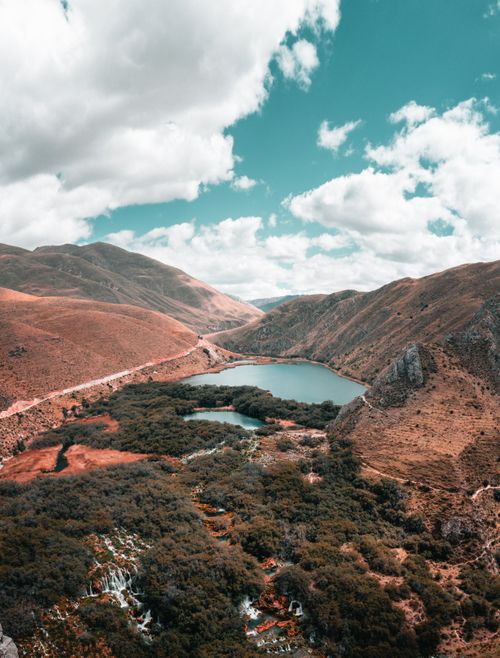 Free Scenic aerial view of Huancaya's stunning mountain range and lakes in Peru. Stock Photo