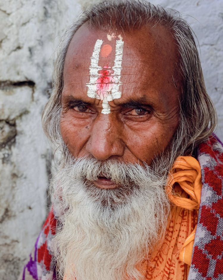 Portrait Of Old Bearded Man With Paint Mark On Forehead