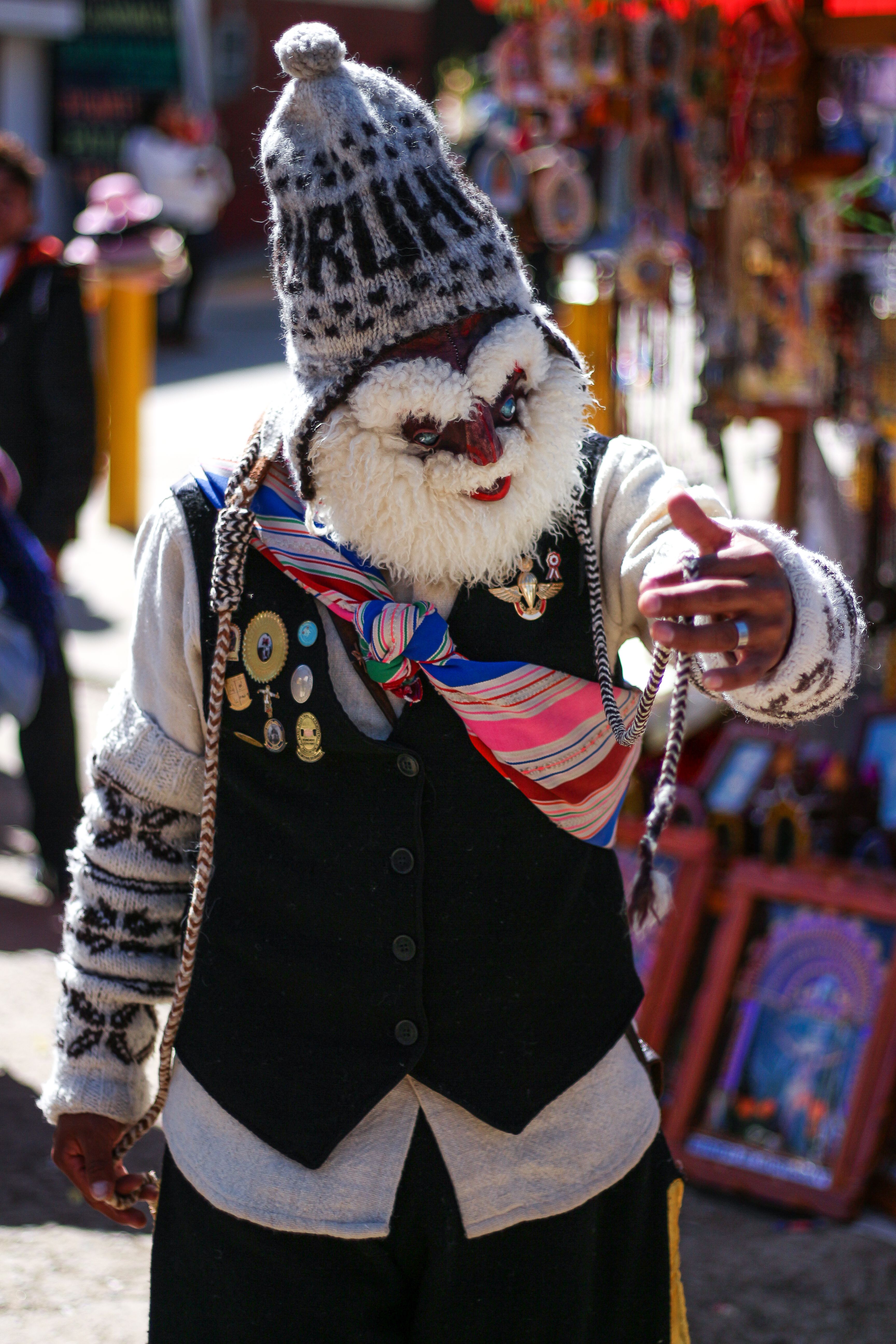 Man in a Costume Walking on a Street during a Parade · Free Stock Photo