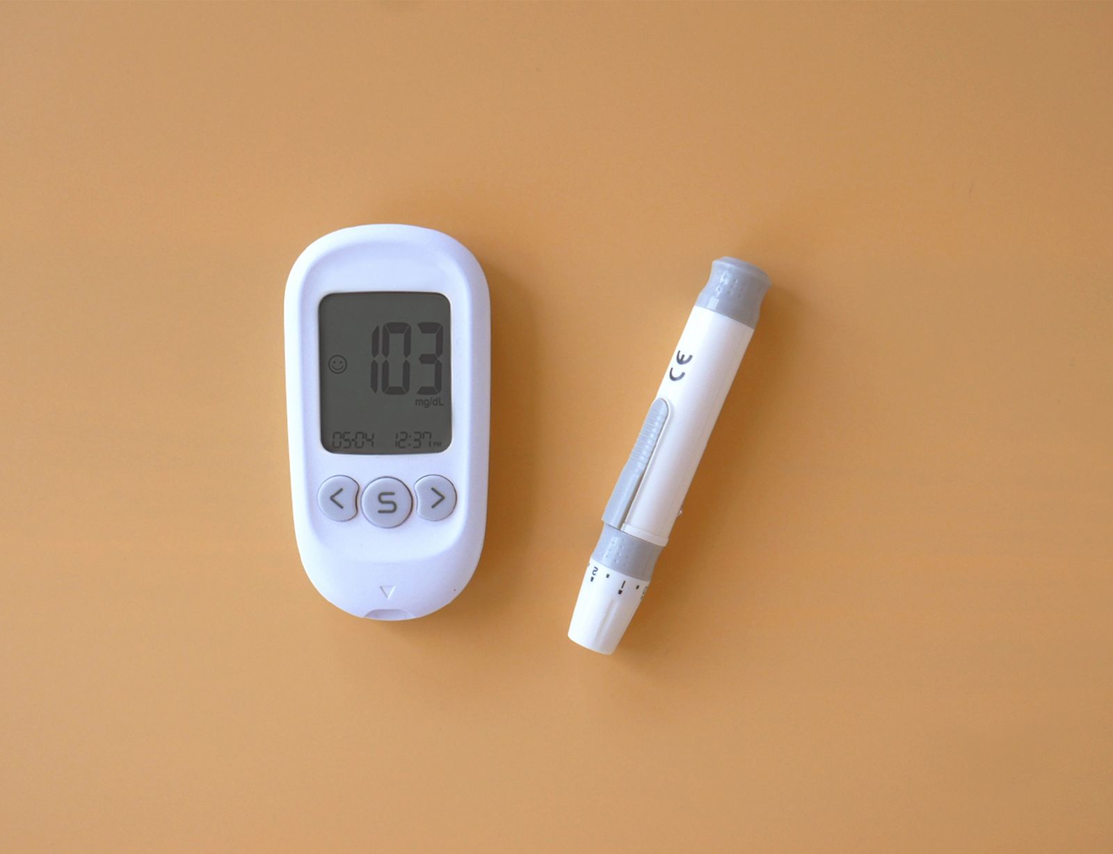 A glucose meter and lancing device used for daily diabetes monitoring