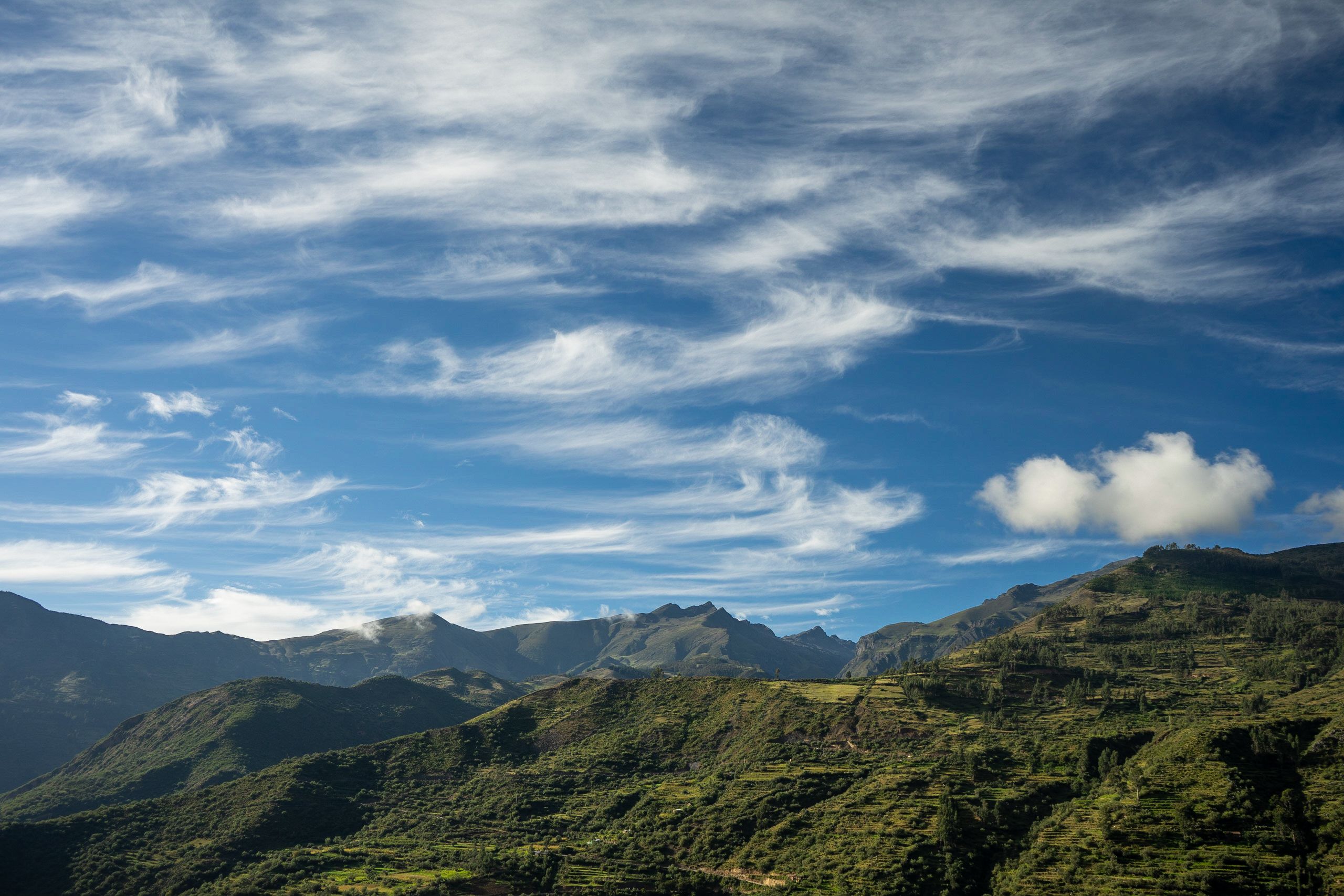 Landscape of Green Mountains under Blue Sky · Free Stock Photo