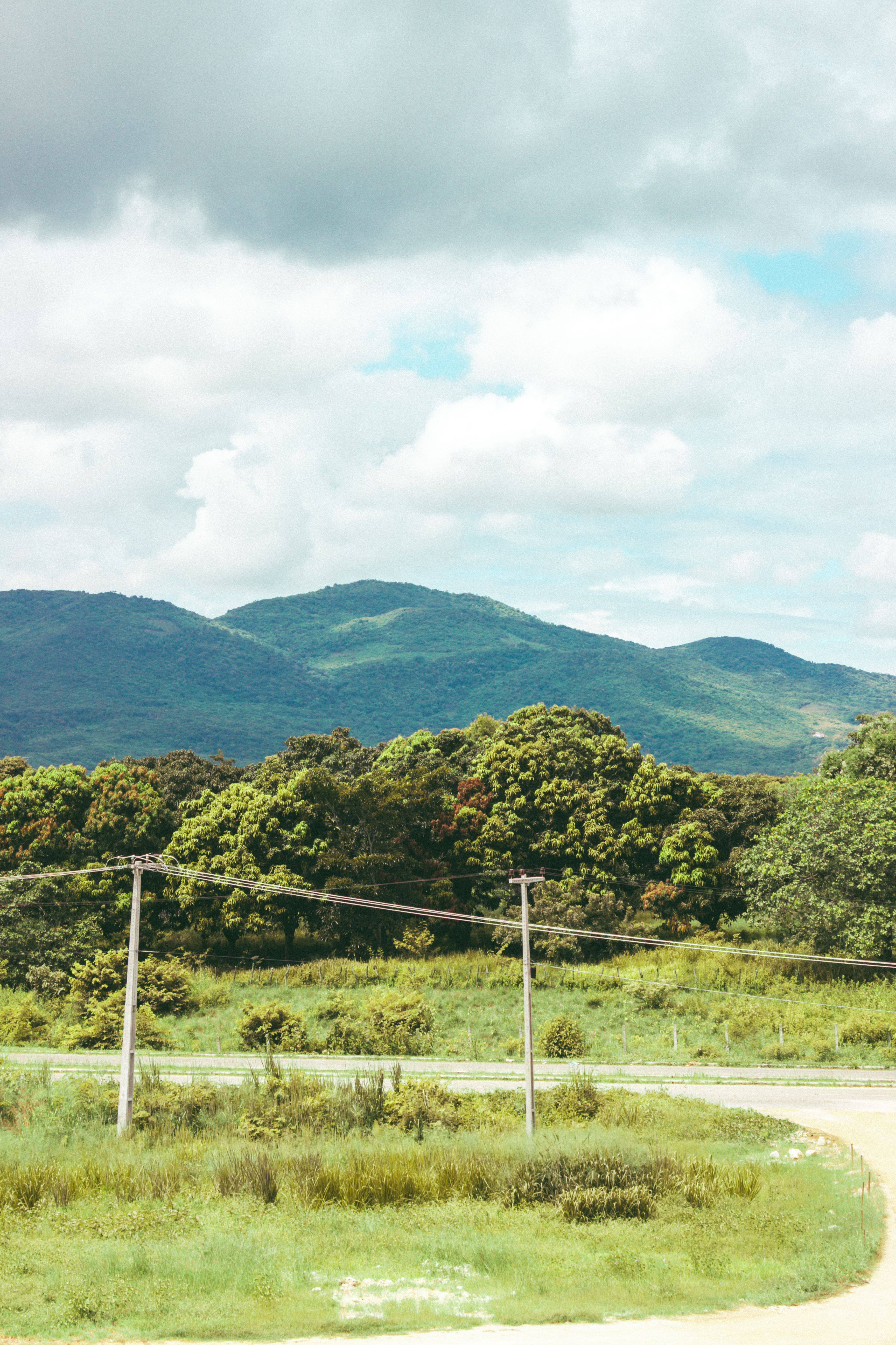 Green Mountains Under White Clouds · Free Stock Photo