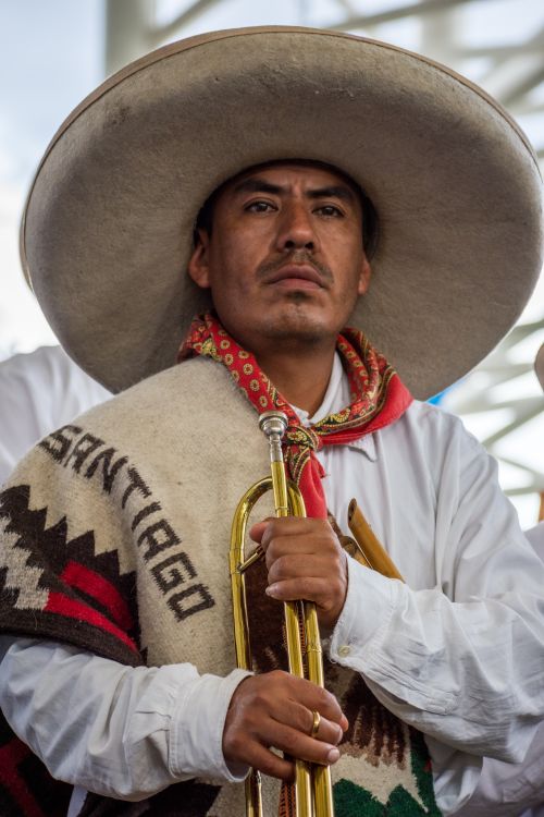 Free Mexican musician in traditional attire holding a trumpet, showcasing vibrant cultural heritage. Stock Photo