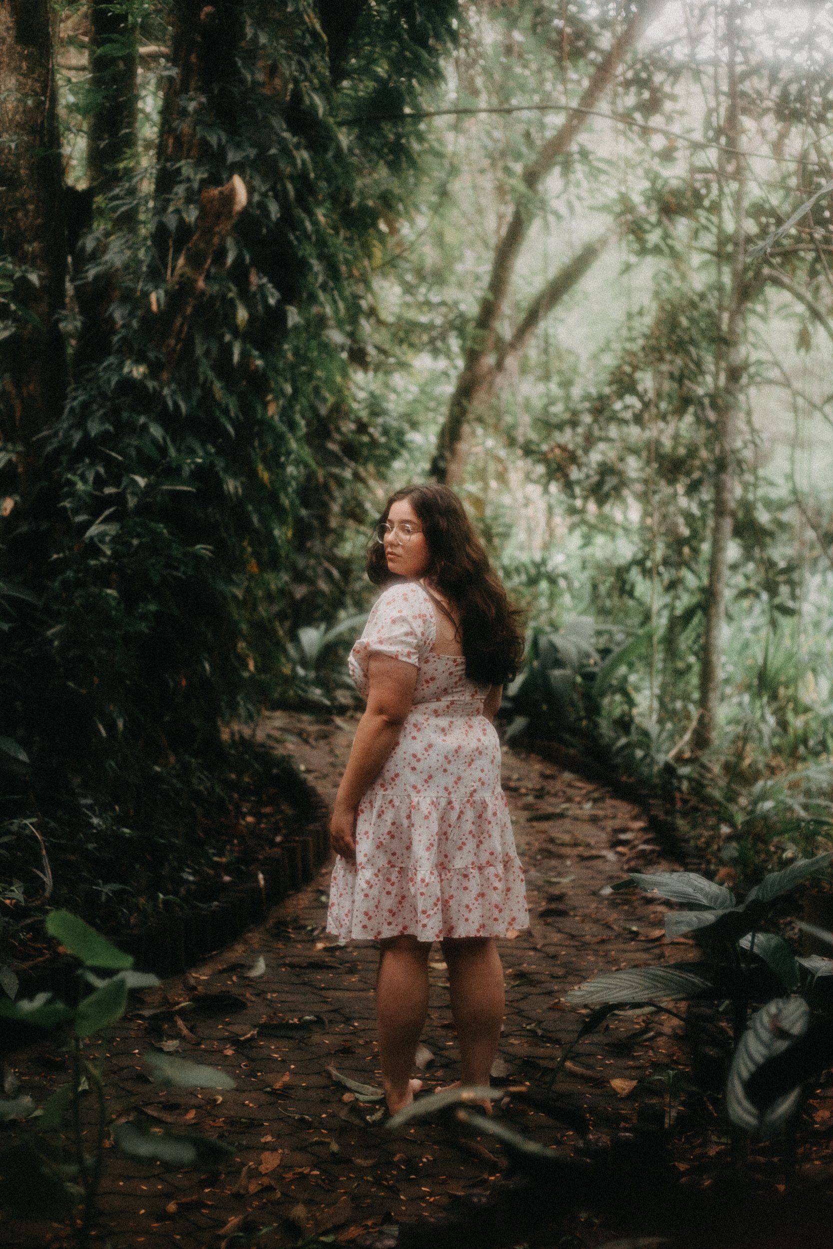 Young Woman in a Dress Standing in the Forest Barefoot · Free Stock Photo