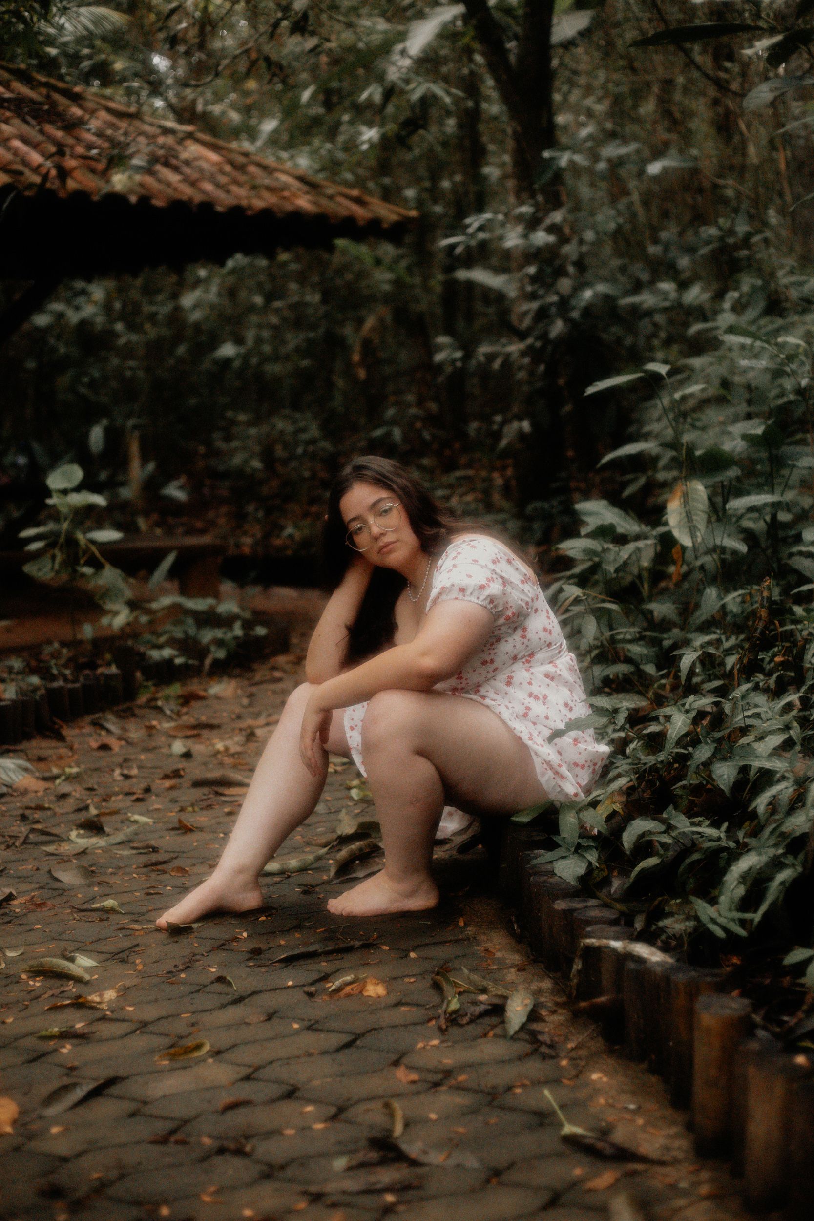 Young Woman in a Dress Sitting in the Forest Barefoot · Free Stock Photo