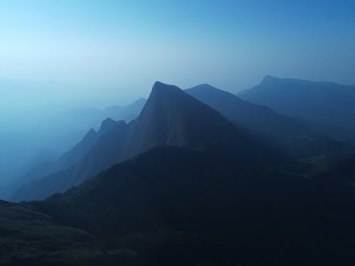 dağ doruğu, dağlar, doğa içeren Ücretsiz stok fotoğraf