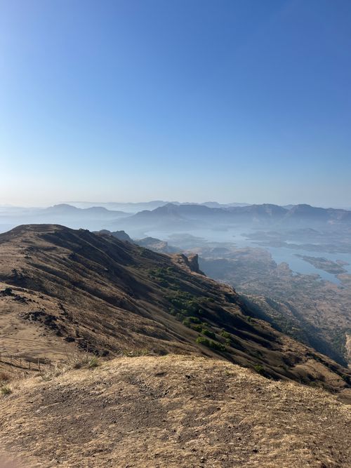 Free A breathtaking view of mountains and valleys in Indore, capturing nature's beauty under a clear sky. Stock Photo