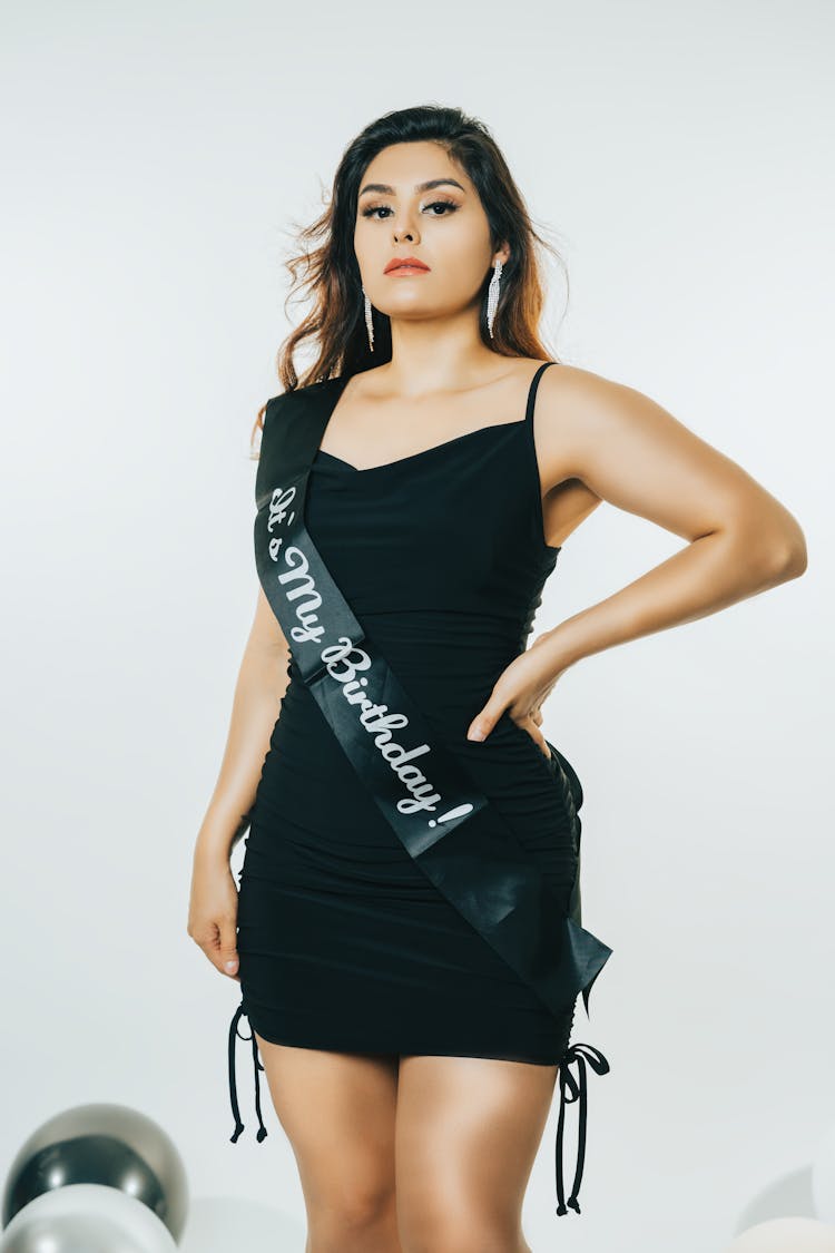 Woman Posing At Her Birthday Party