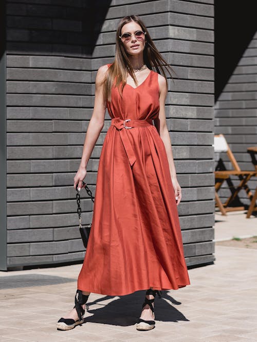 Sunlit Woman in Red Dress