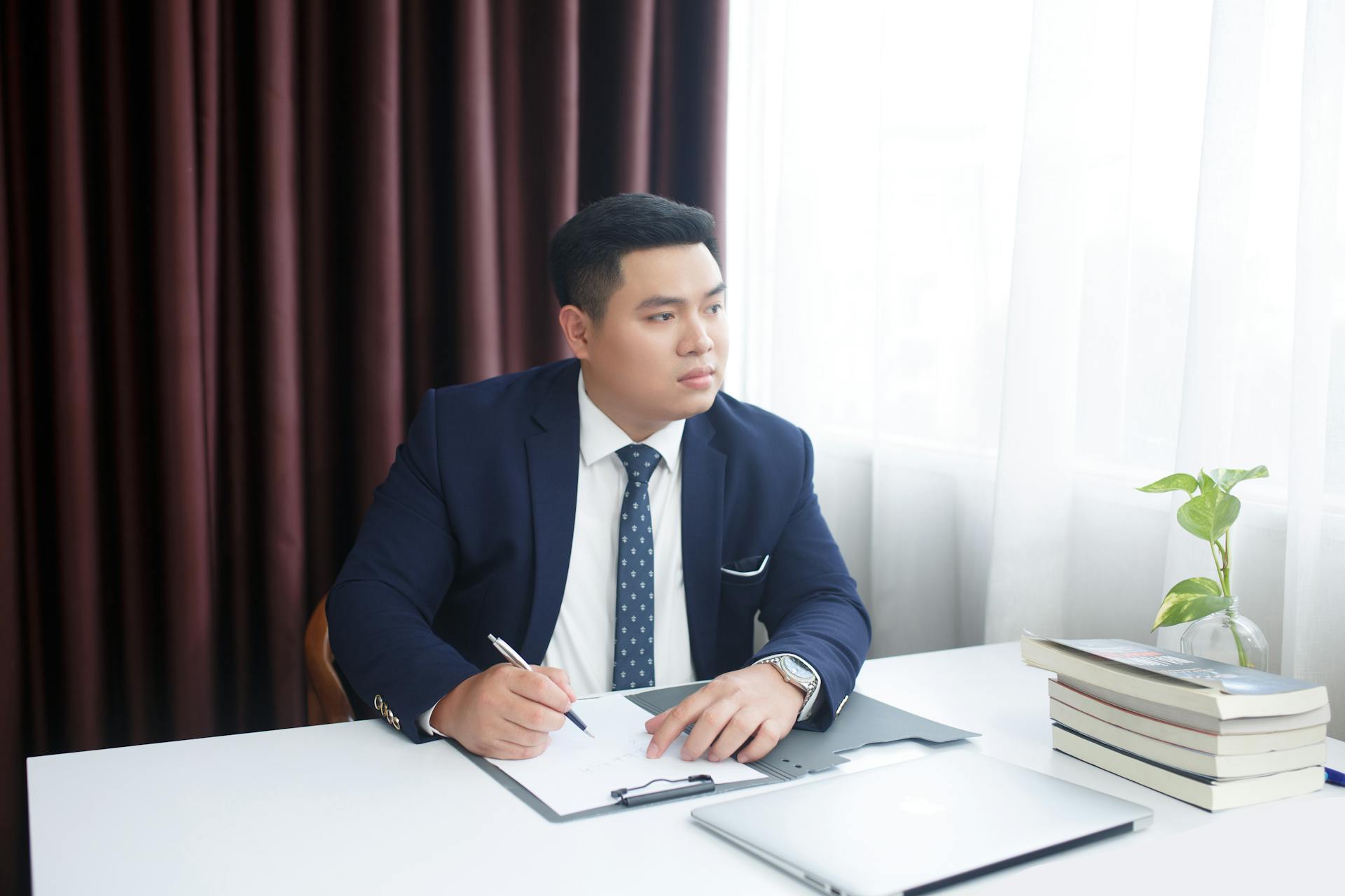 Businessman Signing Document