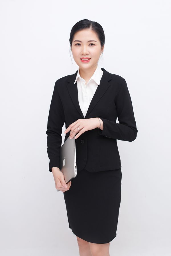 Woman in a black pencil skirt with a silk blouse
