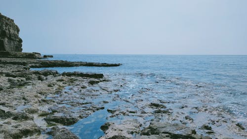Foto profissional grátis de abismo, azul, beira-mar