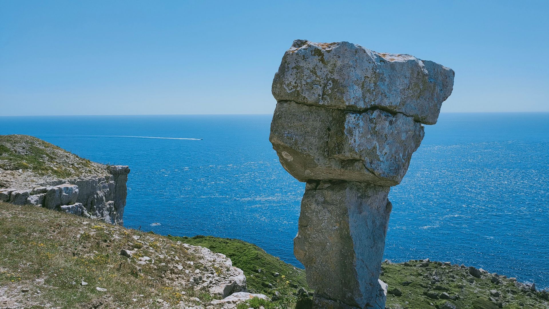 A picturesque seascape with striking rock formations at Easton Cliffs, England.