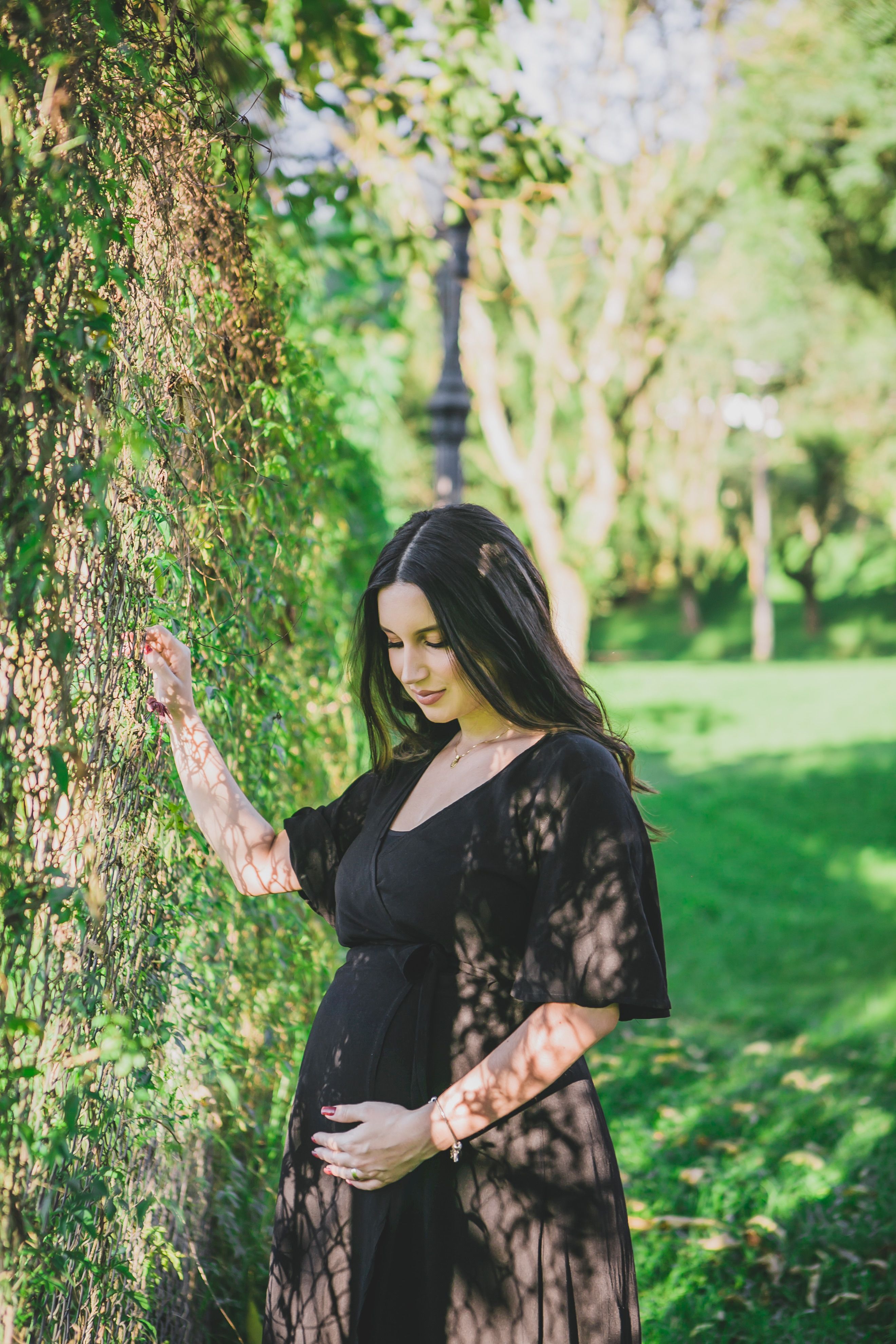 Pregnant Brunette in Park  Free Stock Photo