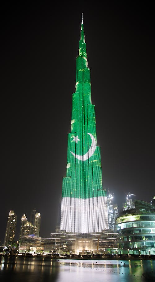 Green flag on the tallest tower of the world