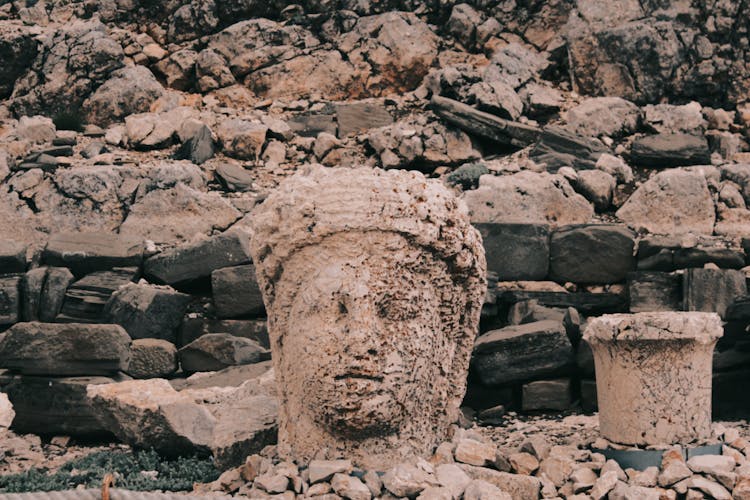 Damaged Ancient Sculpture In Nemrut Dagi In Turkey