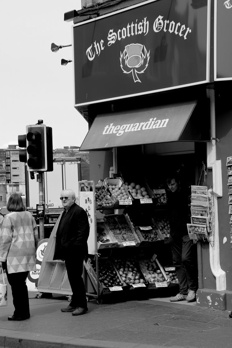 People Standing Near Fruit And Vegetables Stand