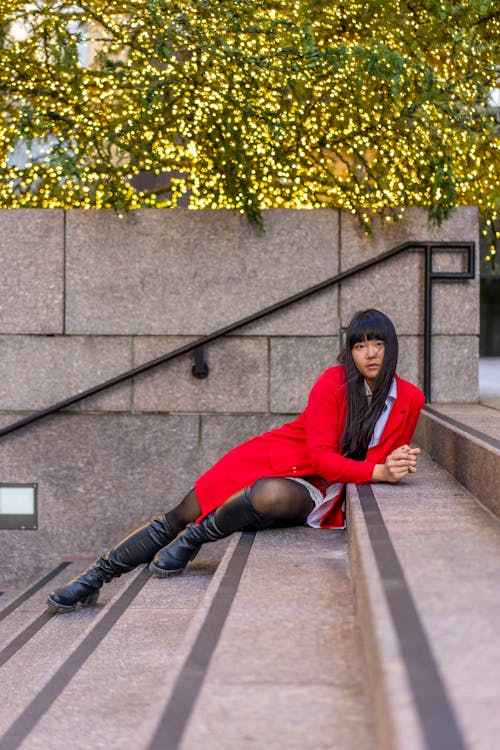 Young Woman in Red Jacket at Christmas Time