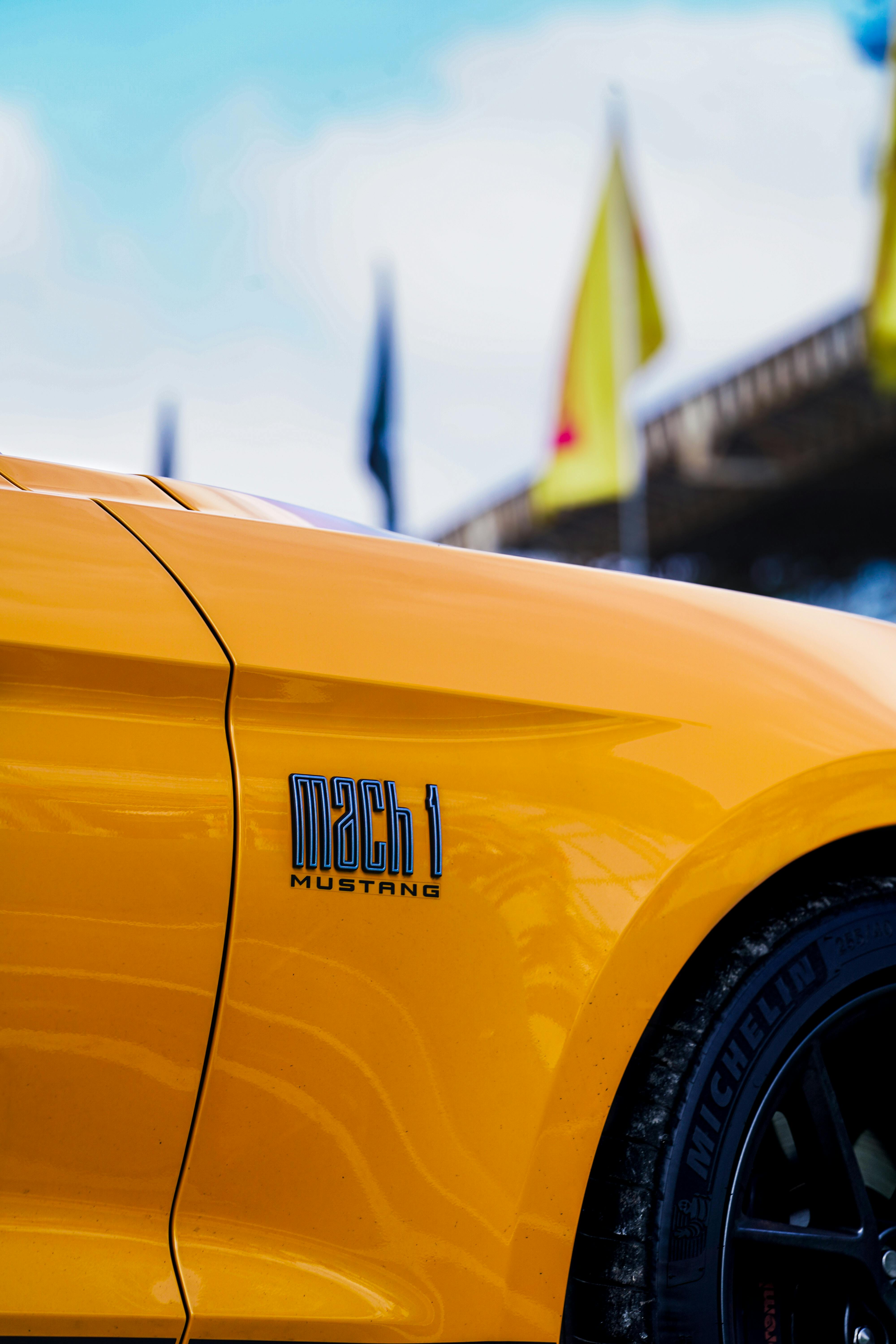 close up of yellow ford mustang