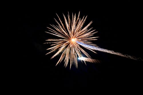 Free Bright and colorful fireworks burst against a black night sky, capturing a moment of celebration. Stock Photo