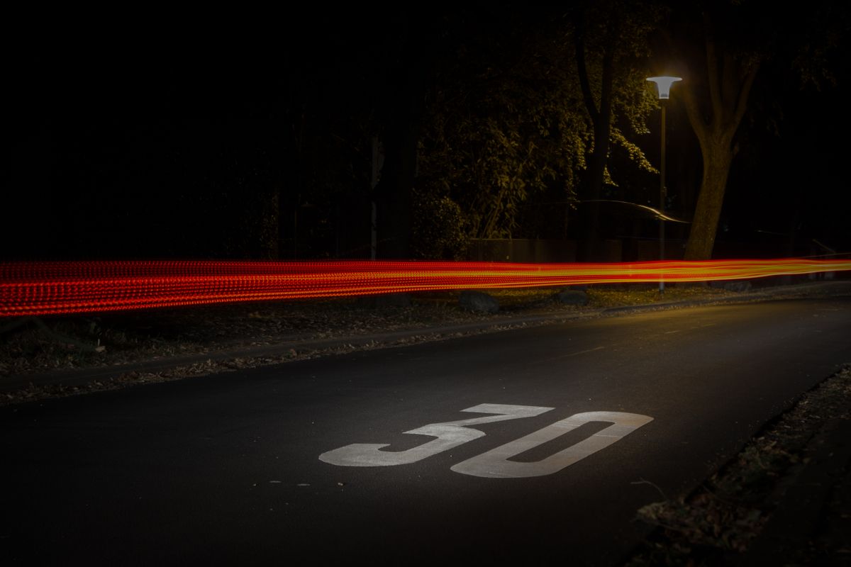 Time-lapse photography of light trails representing high-speed website performance and data loading.