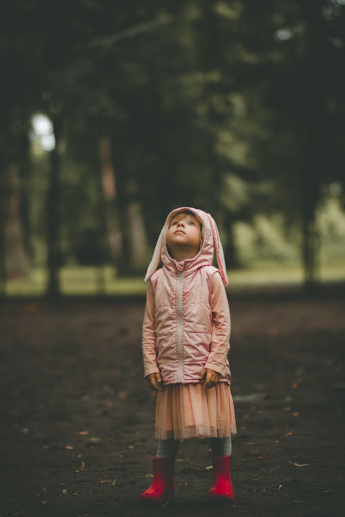 Girl in Jacket and Dress at Park